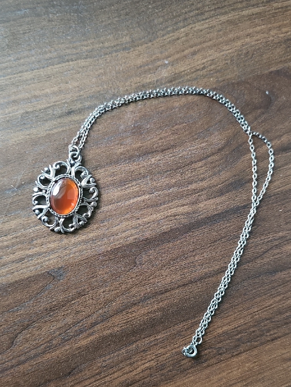 Magic silver-tone filigree pendant necklace with warm amber-like cabochon - Picture 3 of 4